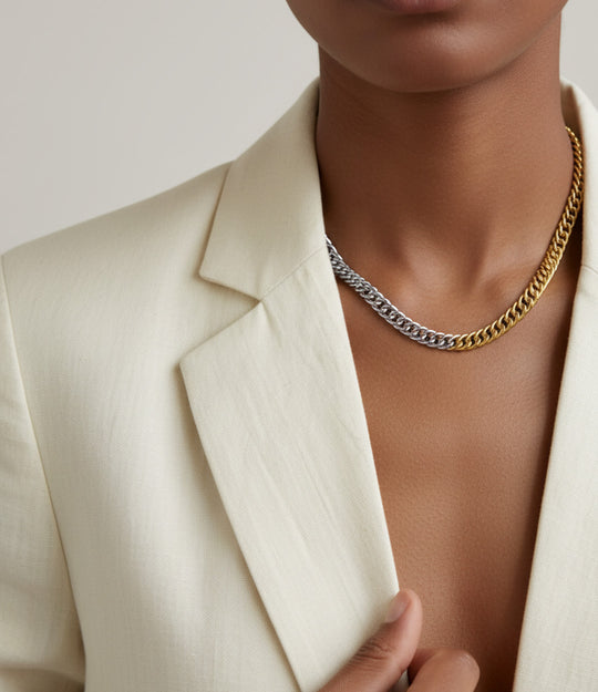 Stylish two-tone necklace blending silver and gold links, designed for layering or standalone wear