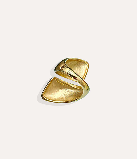 Big Hug Ring in 14k gold plated stainless steel, featuring a thick, fluid wrap-style design isolated on a white background