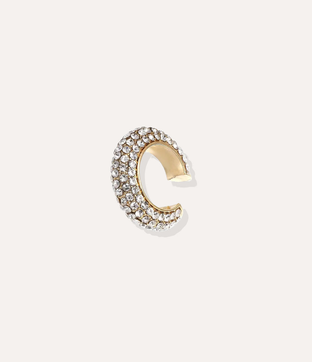 Close up of the Bling Ear Cuff in gold highlighting the vibrant white diamonds and sleek finish.