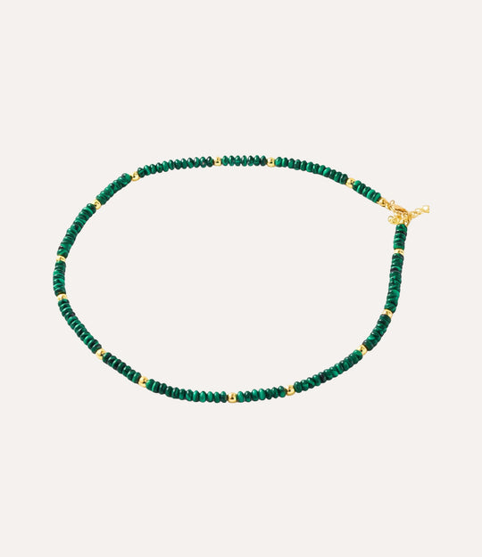 Green marble beaded necklace with gold clasp.