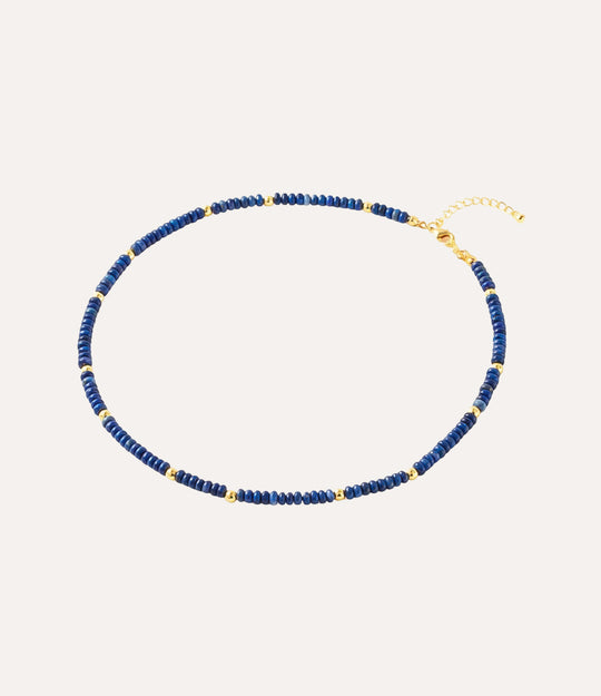 Necklace with blue beads and gold accents. A perfect gift for teens or boho lovers.