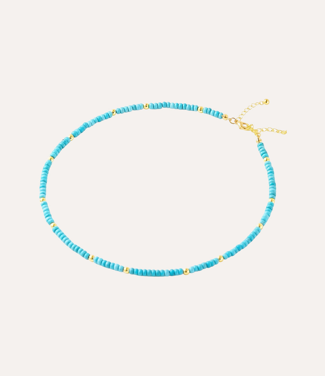 Turquoise beaded necklace with gold clasp. A perfect gift for teens or boho lovers.