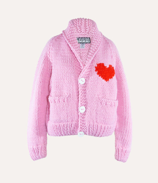 Pink cardigan with a red heart design on a white background