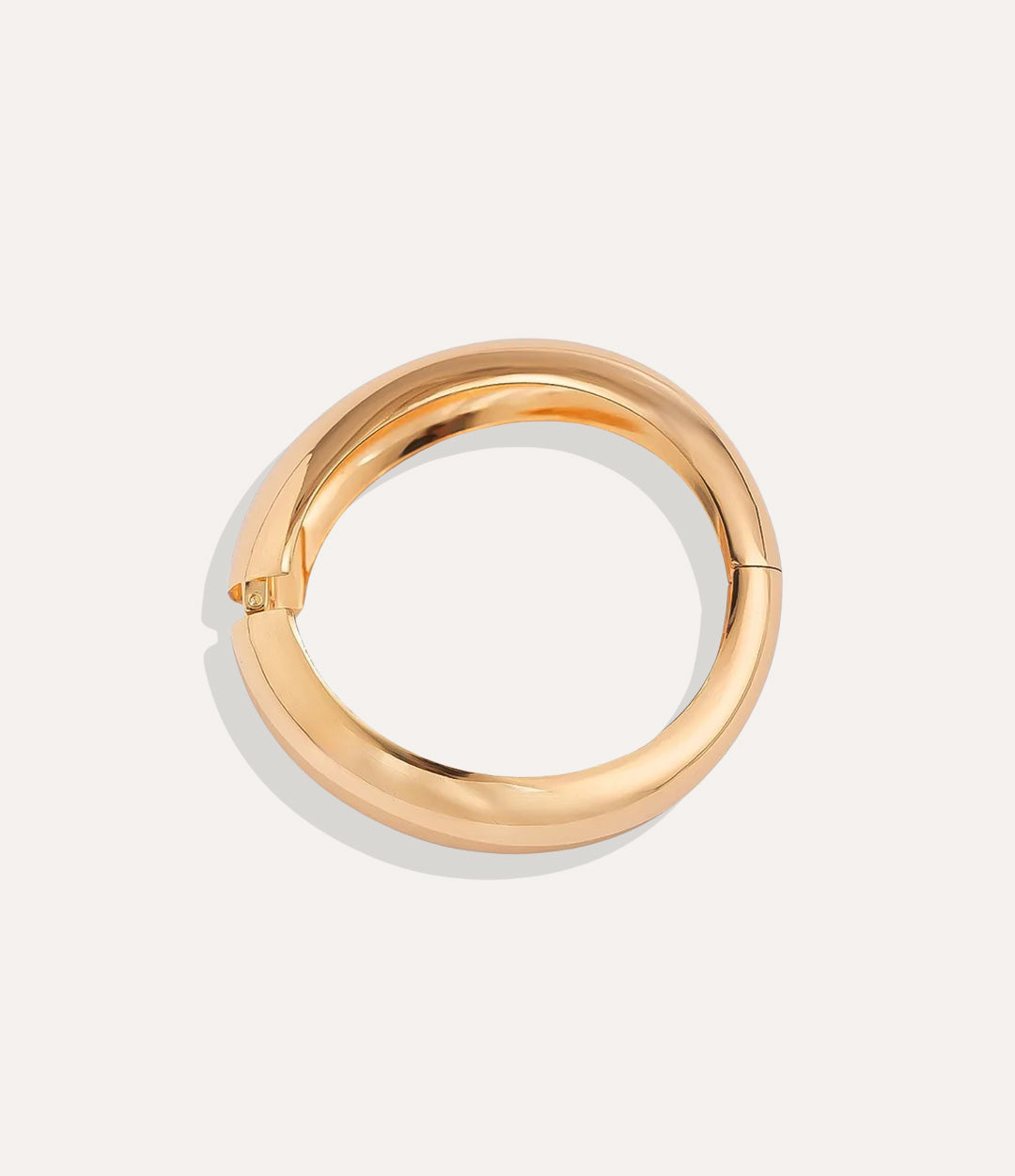 Gold Classic Bangle bracelet with a sleek, polished finish displayed on a neutral background