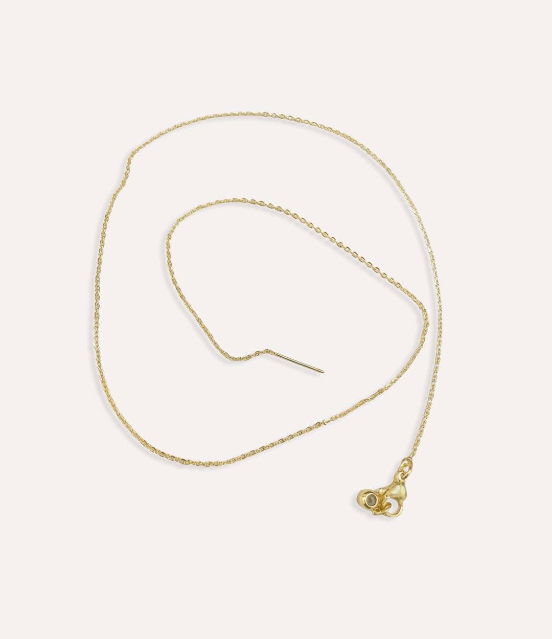 Classic gold chain necklace with adjustable length on white background