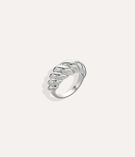 Sterling Silver Croissant Ring, highlighting the cool polished finish, sculptural braided texture, and waterproof construction.