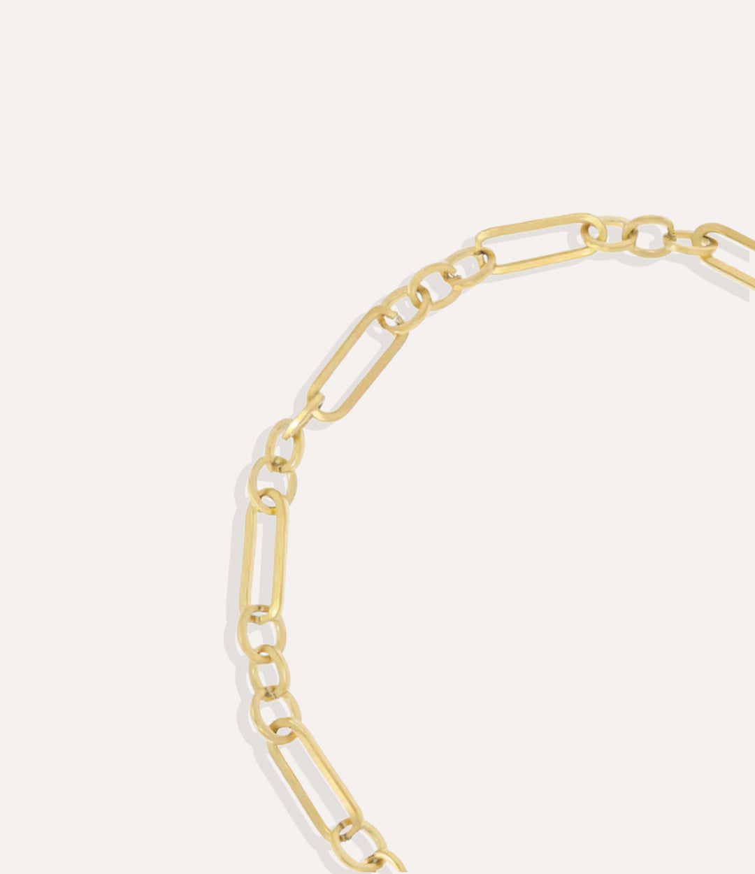 Close-up of the Daisy Chain Necklace showing its polished gold chain links