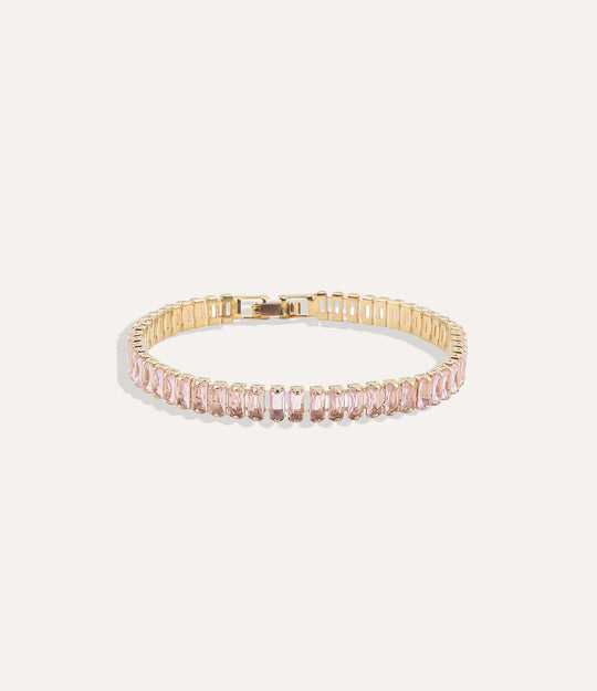 Dazzle Tennis Bracelet with pink sparkling stones in a sleek design displayed on a neutral background.