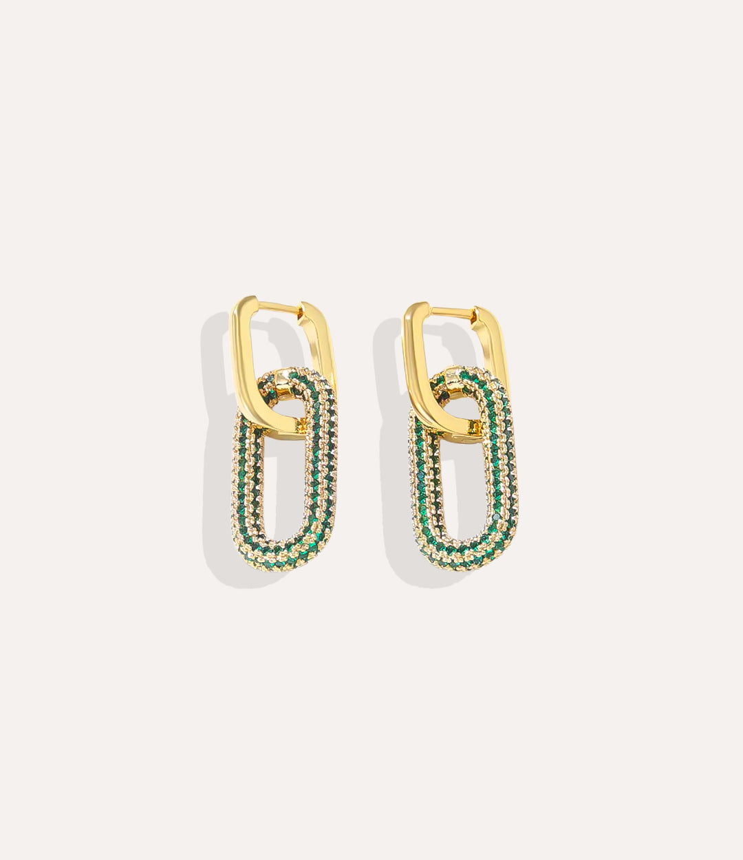 Product shot of the Diamond Carabiner Earrings in 14k gold plating displaying the separate rectangular hoops and ornate green diamond carabiner charms on a white background.