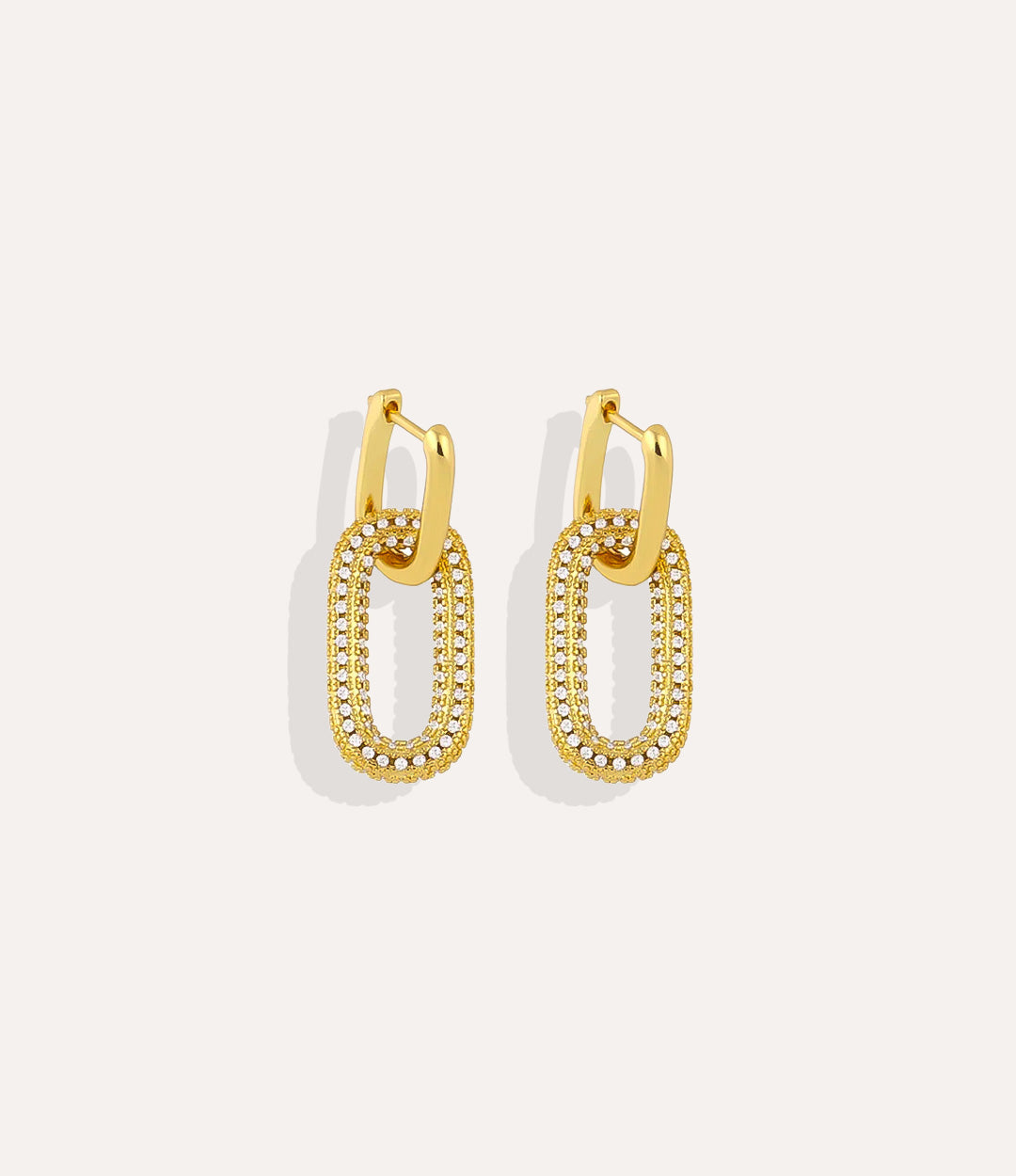 Product shot of the Diamond Carabiner Earrings in 14k gold plating displaying the separate rectangular hoops and ornate white diamond carabiner charms on a white background.