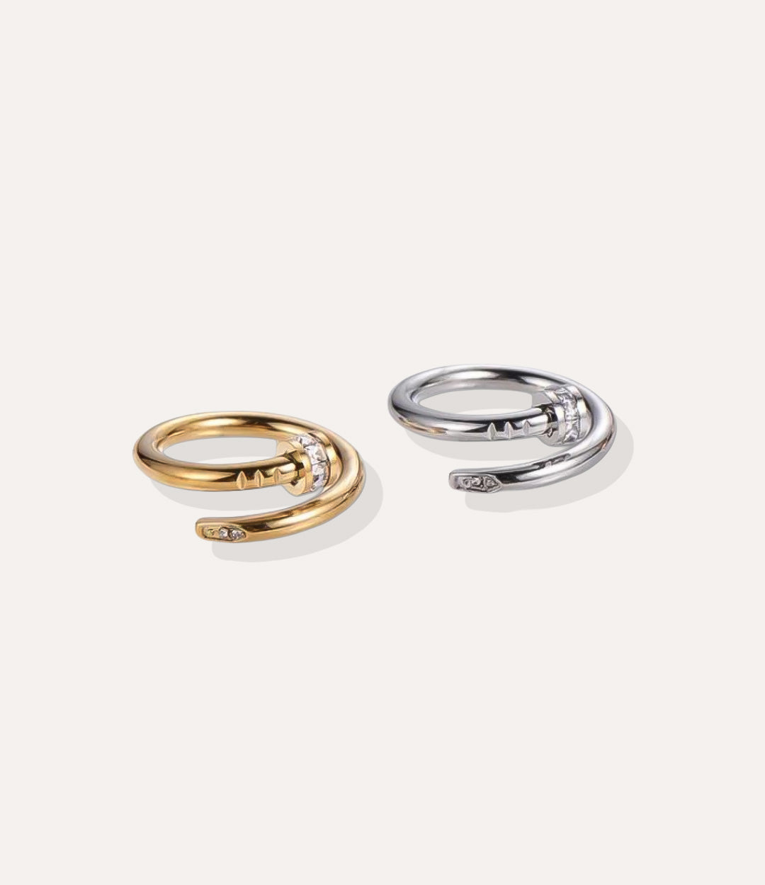 Diamond Screw Ring in gold and silver finish, featuring a polished band adorned with screw motifs and diamond accents, isolated on white.