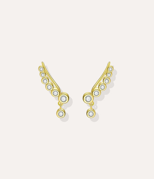 Close up of the Diamond Wing Earrings in gold highlighting the graceful wing design and diamond details.