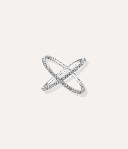 Diamond X Ring in white gold finish, featuring a sleek intersecting X shape adorned with diamonds, isolated on a white background.