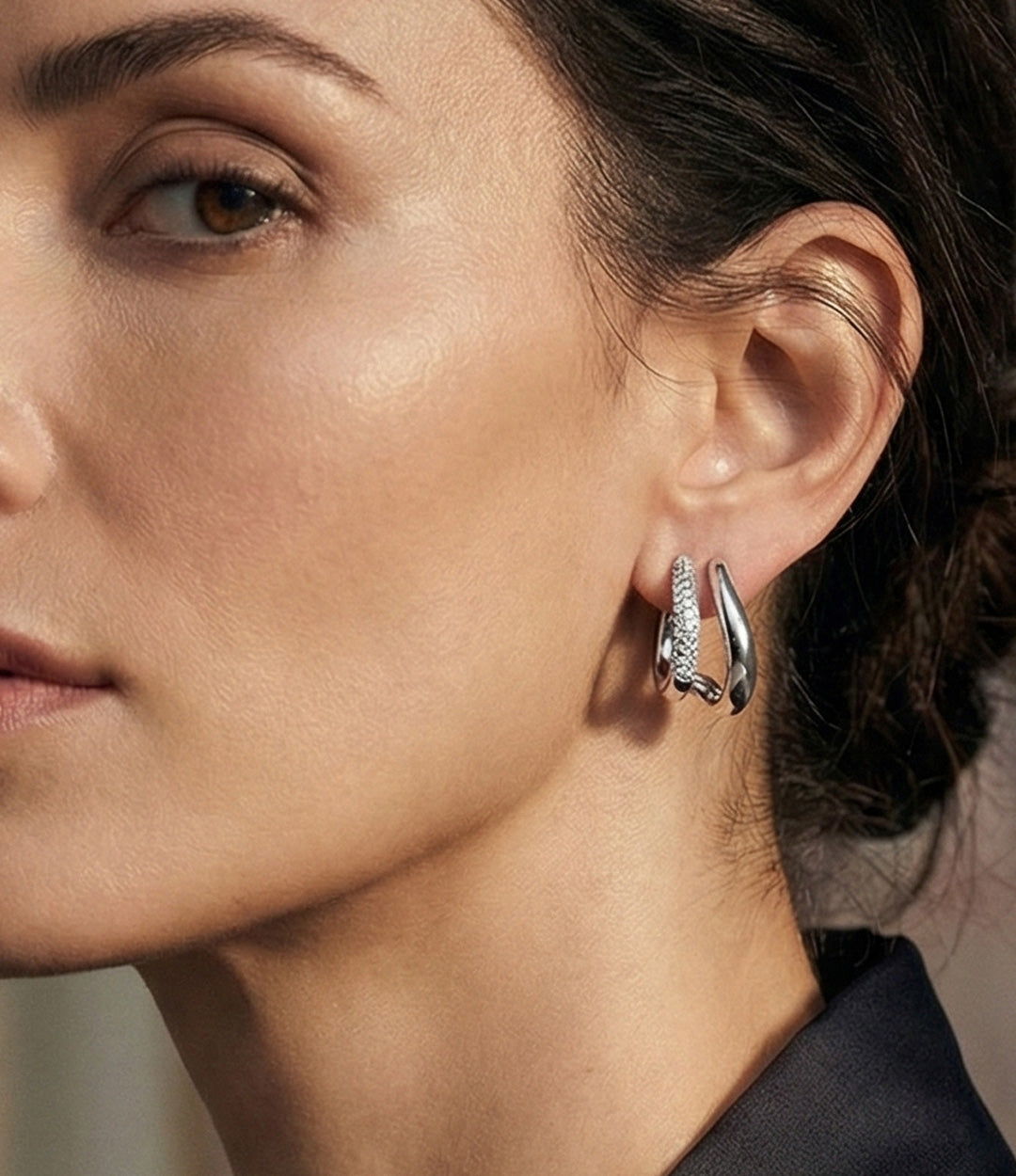 Model wearing Double Spike Studs showing bold spike earrings with subtle diamond accents.