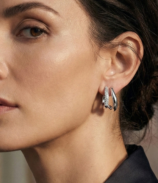 Model wearing Double Spike Studs showing bold spike earrings with subtle diamond accents.