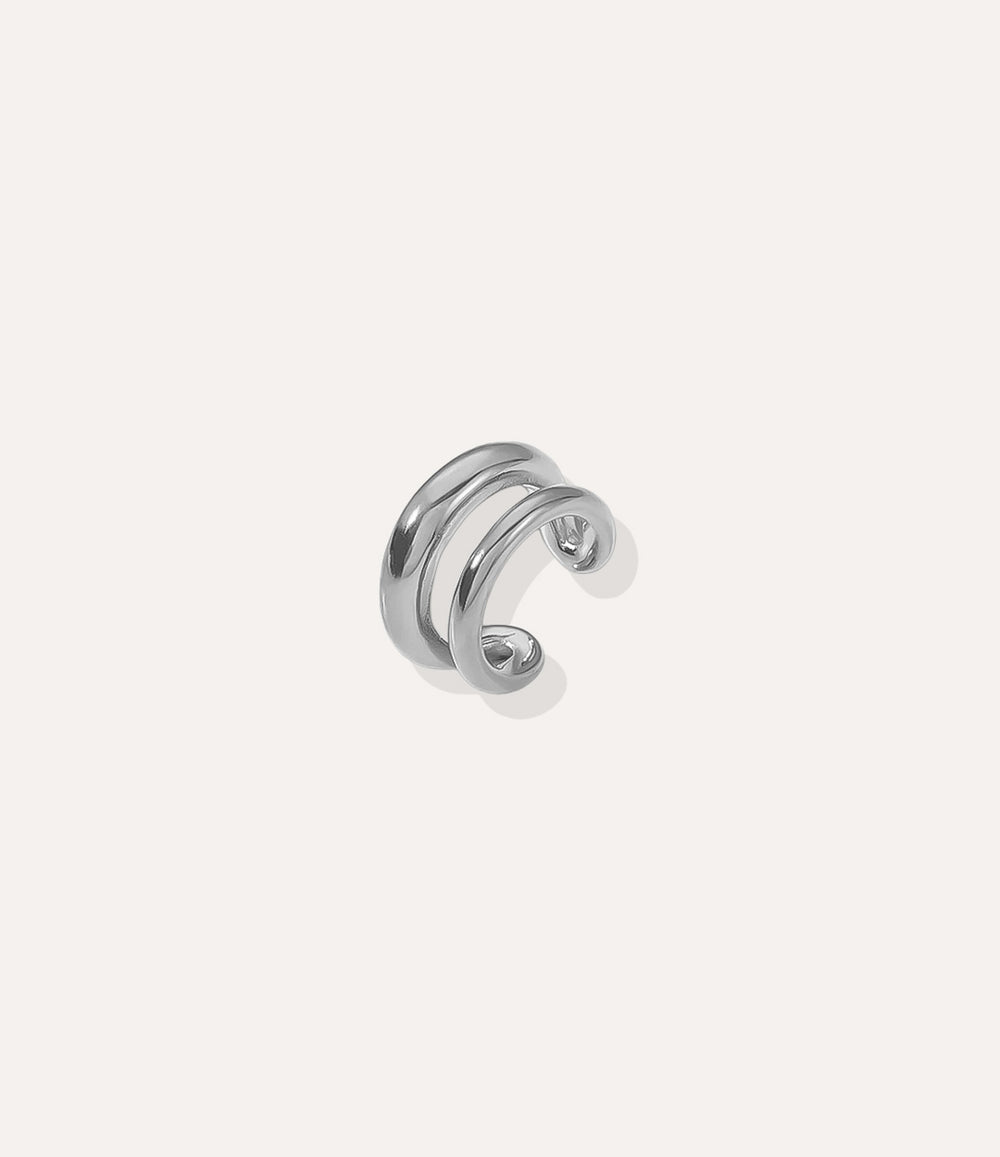 Close up of the Double Ear Cuff in silver, highlighting the asymmetric double band and stainless steel finish.
