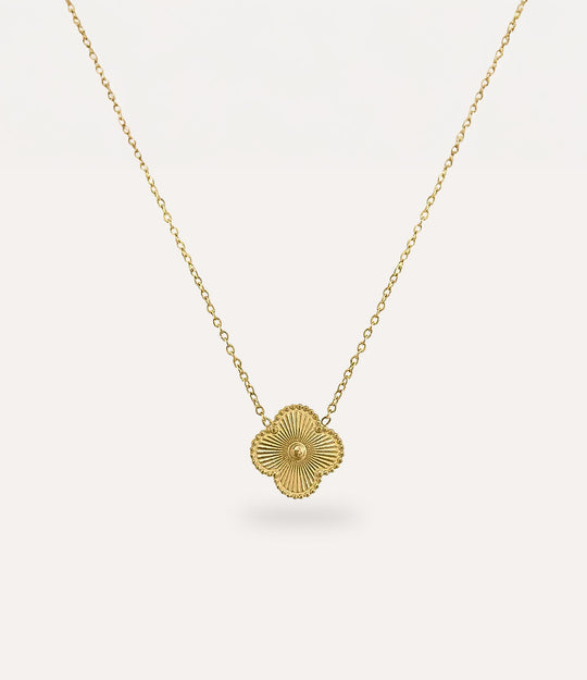 Double Sided Clover Necklace in gold plating displayed on a clean neutral background