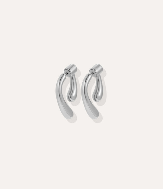 Close up of the Double Sided Drop Earrings in silver, featuring the shiny silver finish and stylish drop silhouette.