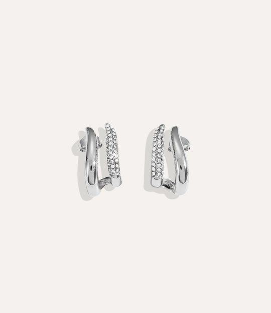Double Spike Studs in silver with modern spike design and subtle diamond accents.