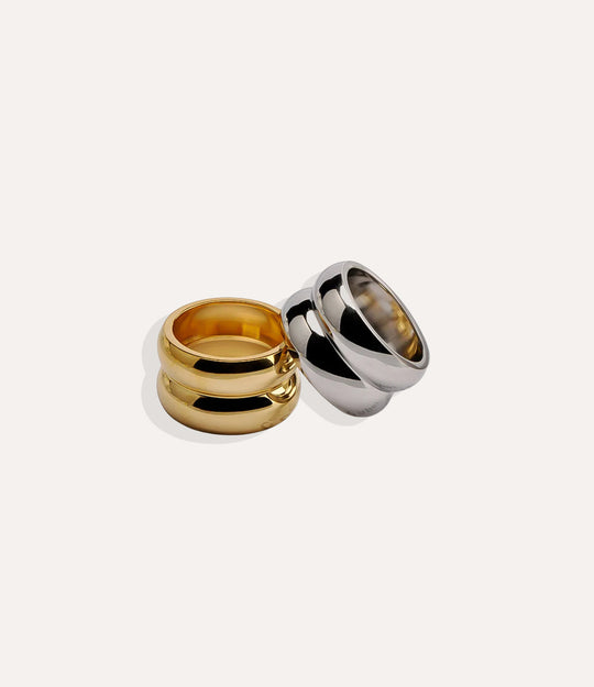 Gold and silver rings on a white background