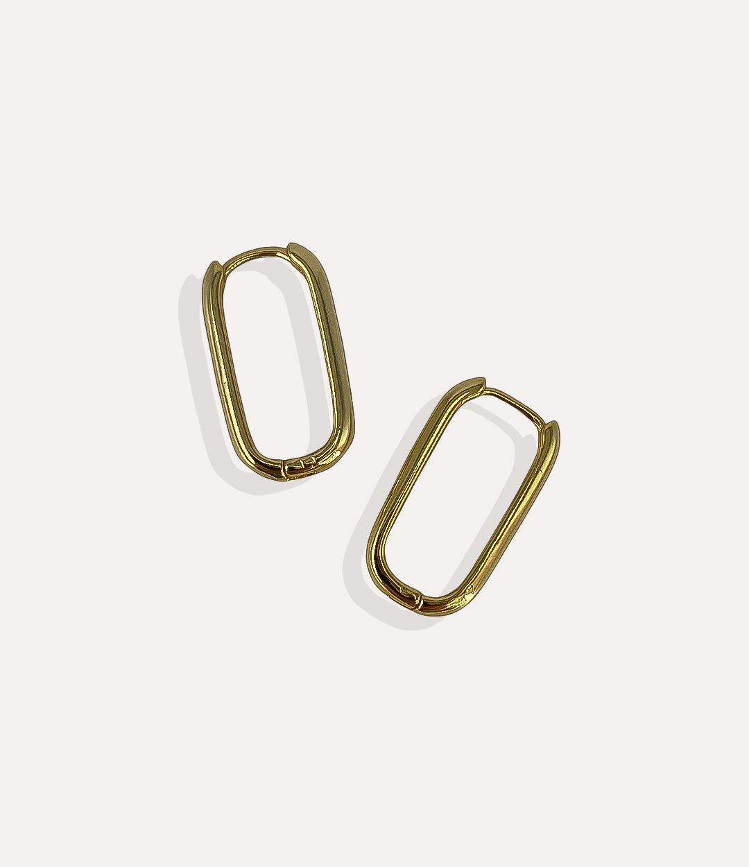 Product shot of the large Emma Vertical Hoops in 14k gold plating displaying the sleek vertical lines and high shine finish on a white background.