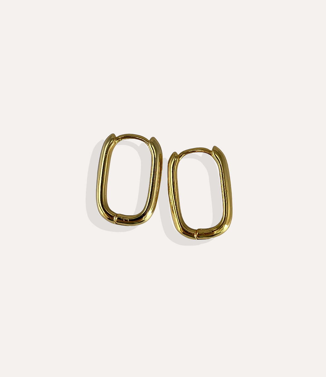 Product shot of the medium Emma Vertical Hoops in 14k gold plating displaying the sleek vertical lines and high shine finish on a white background.