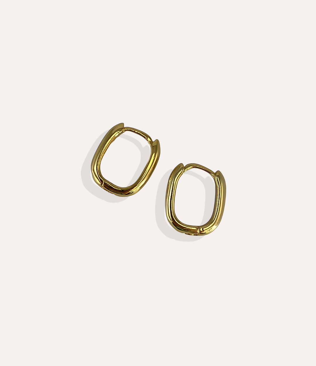 Product shot of the small Emma Vertical Hoops in 14k gold plating displaying the sleek vertical lines and high shine finish on a white background.