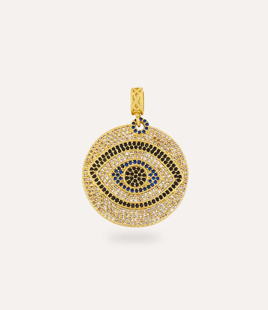 Gold pendant with evil eye design on a white background