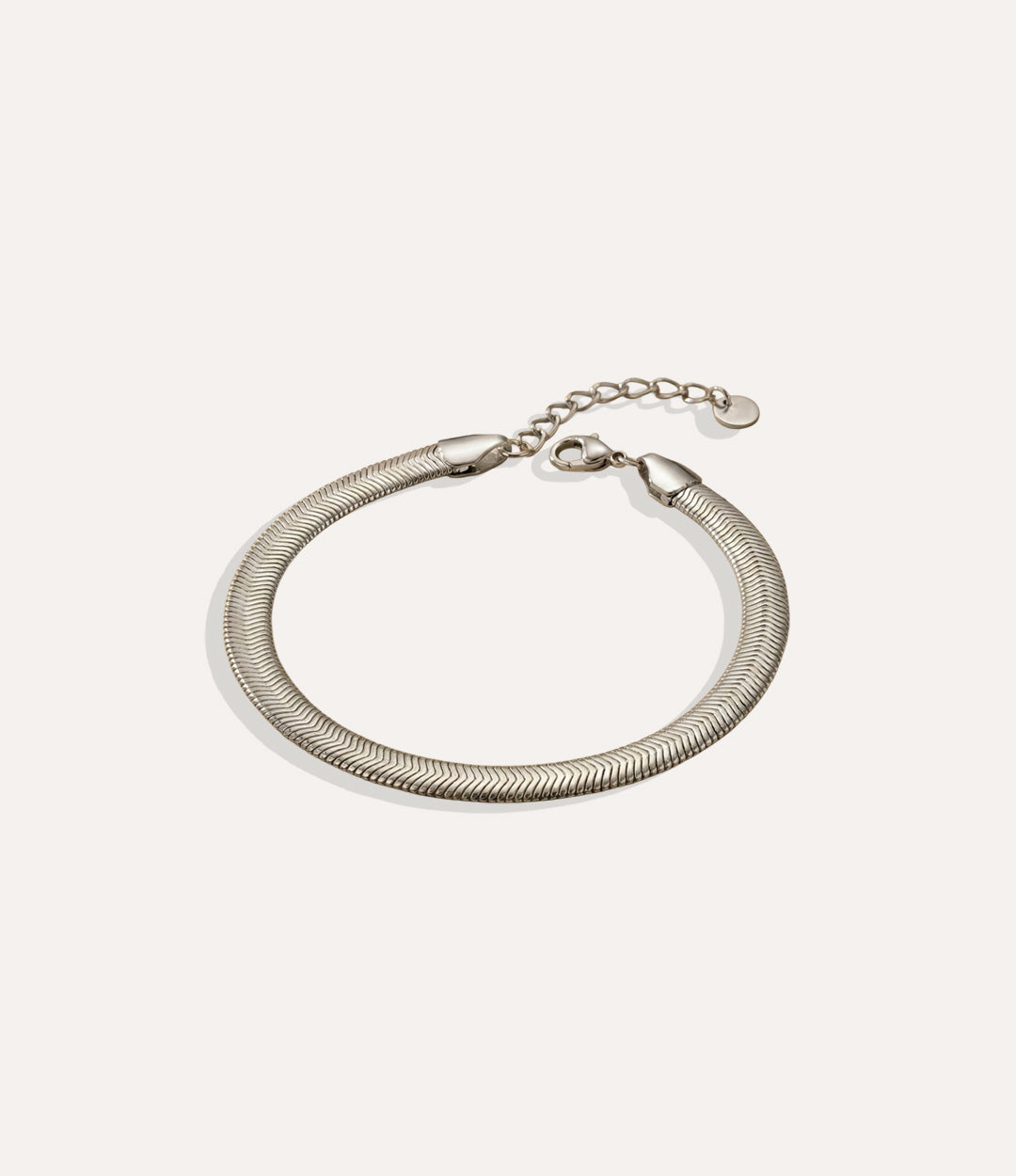Flat Snake Bracelet in silver displayed on a neutral background