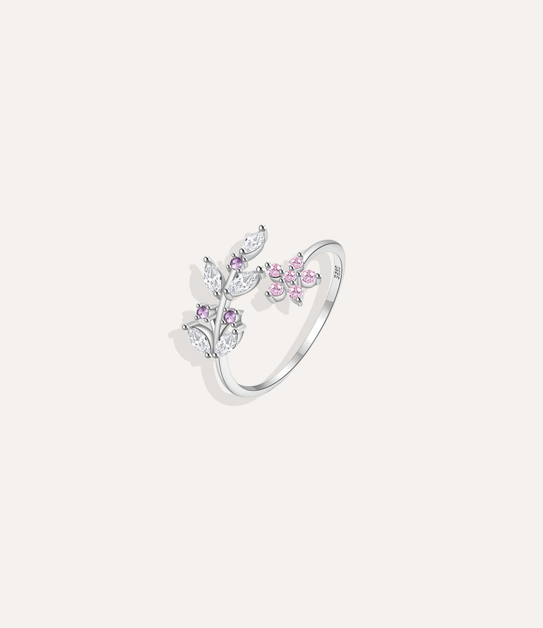 Sterling silver Garden Flower Ring with intricate flower and leaf detailing, showing the high-shine silver finish and adjustable sizing.