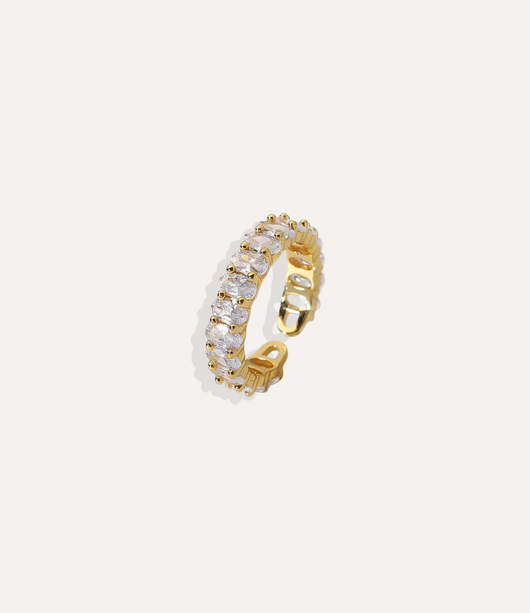 Glitz and Glam Ring Stack in 14k gold plated stainless steel, featuring a sparkling multi-ring design with oval stones isolated on a white background.