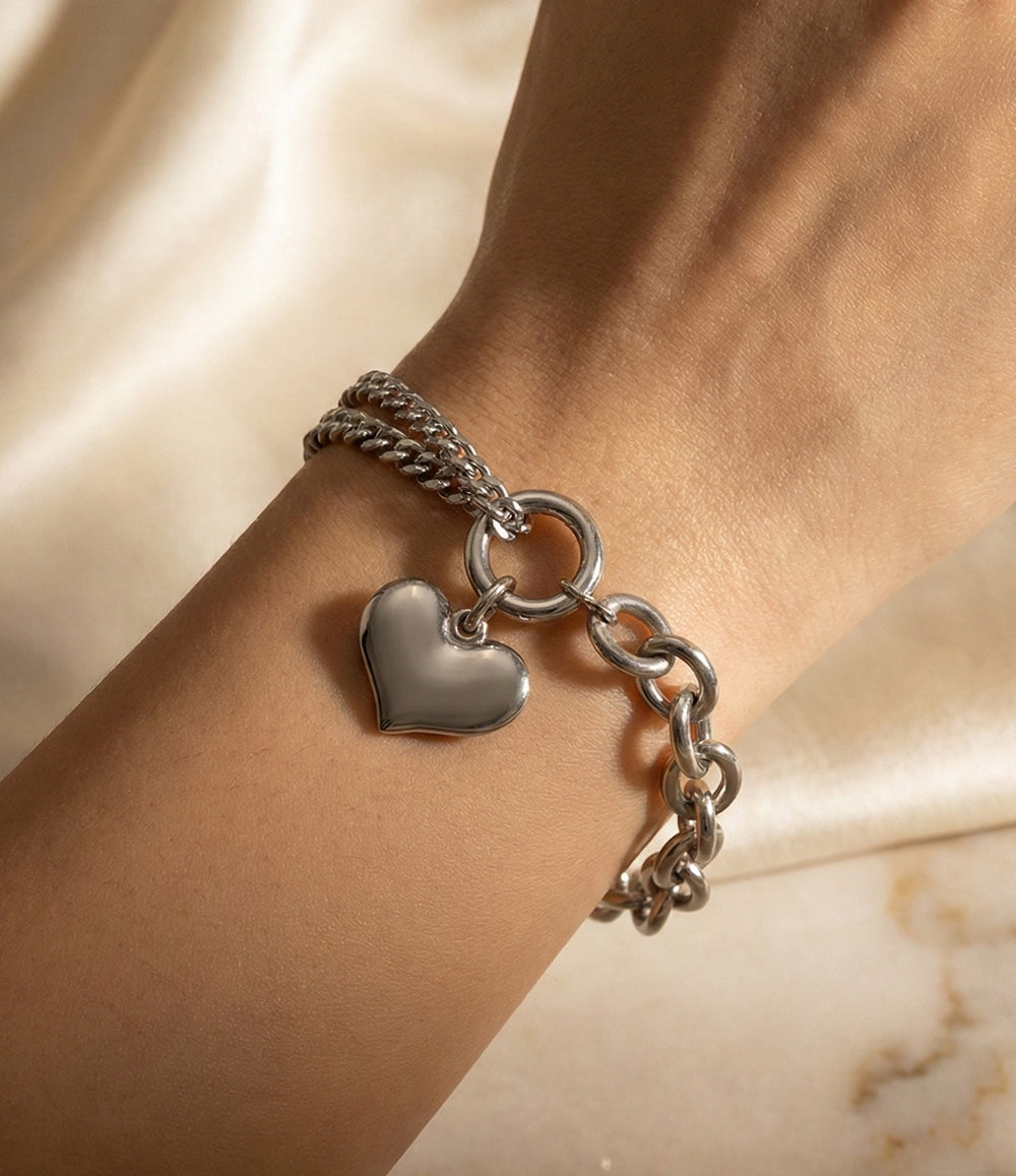 Model wearing the Love Chain Bracelet in silver, highlighting its multi-chain design.