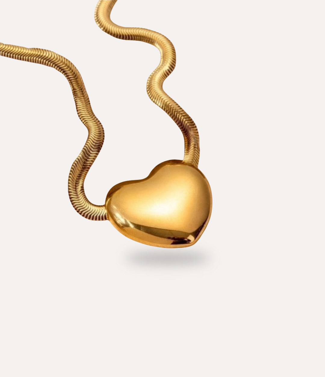 18k gold plated snake chain necklace displayed on neutral background