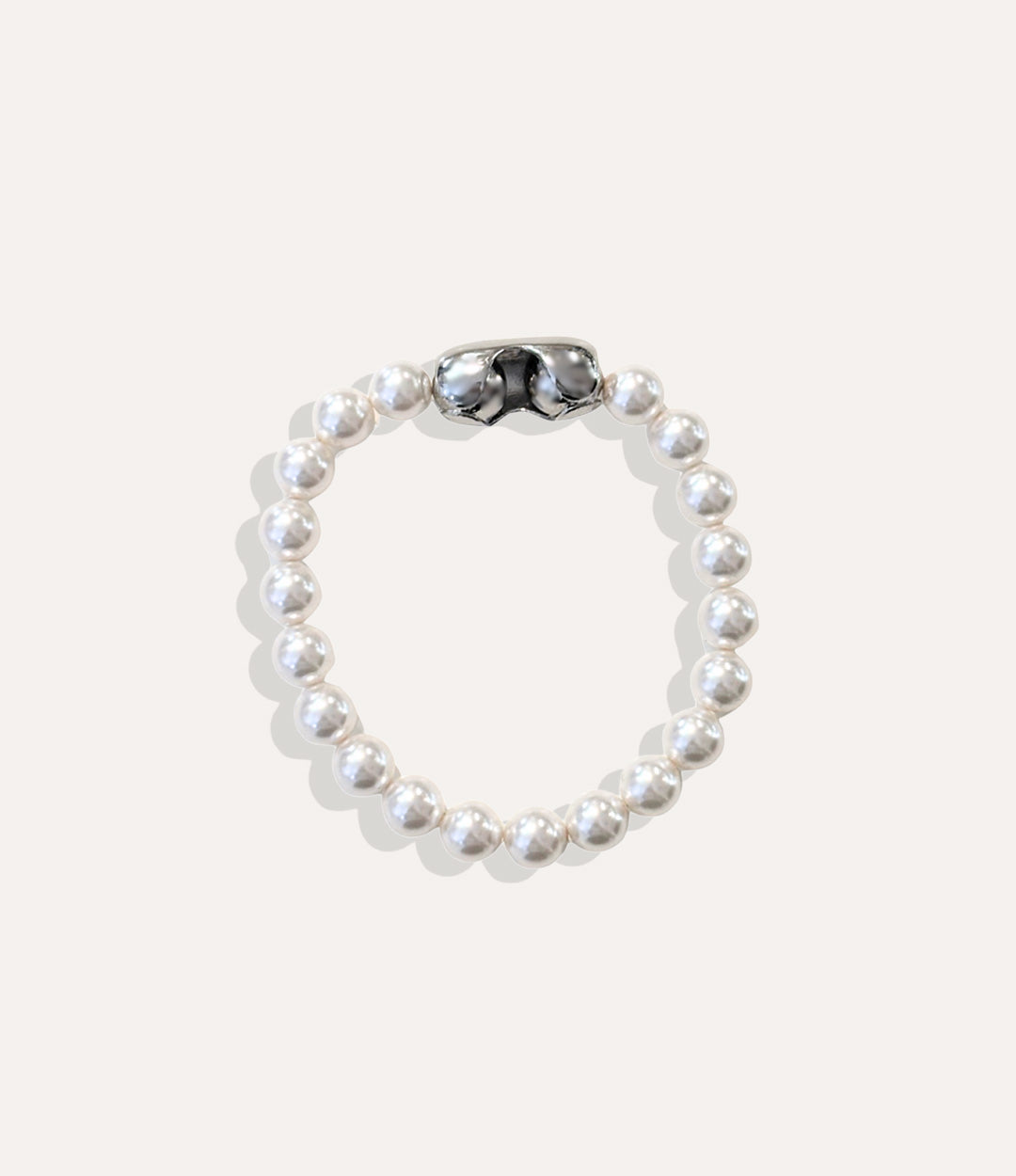 Classic pearl bracelet with large 10mm pearls and sleek magnetic clasp displayed on neutral background