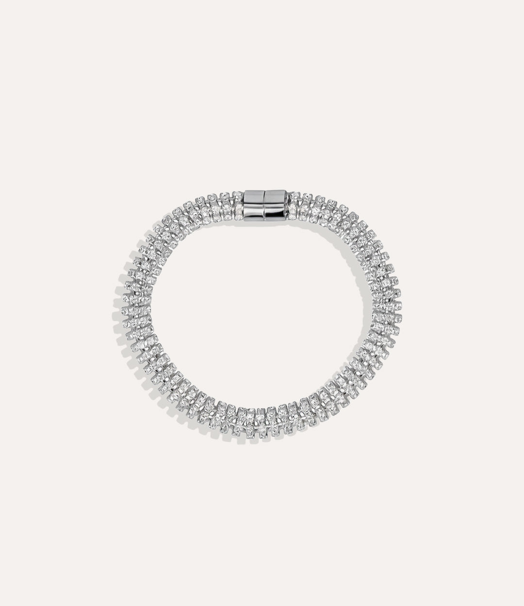 Silver Magnetic Tennis Bracelet with shimmering stones and magnetic closure displayed on a neutral background