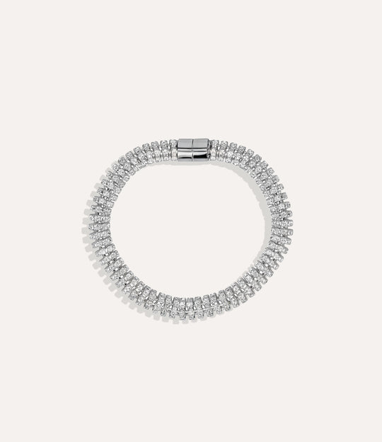 Silver Magnetic Tennis Bracelet with shimmering stones and magnetic closure displayed on a neutral background