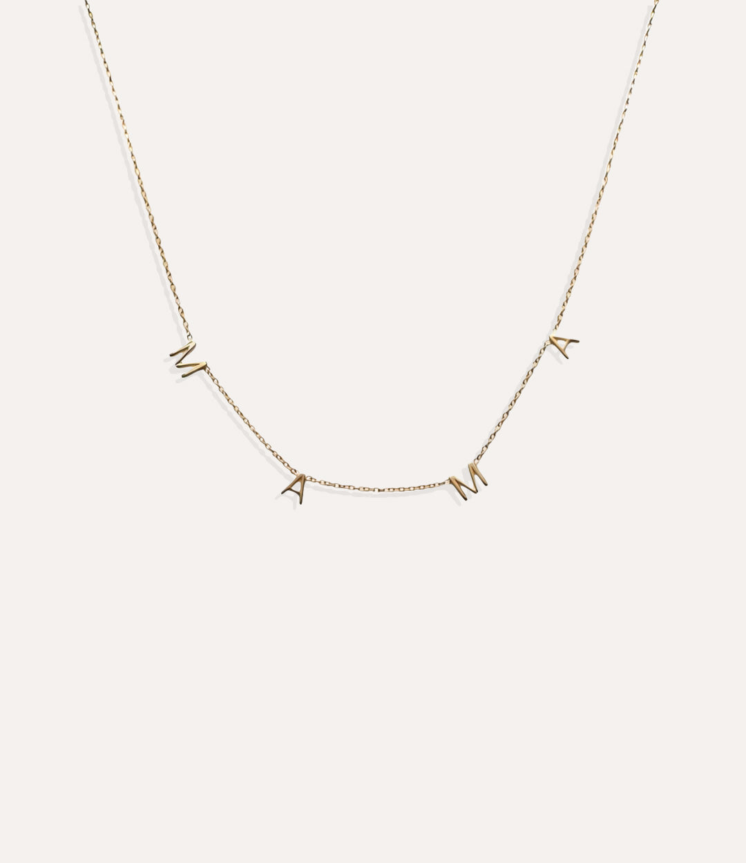 Dainty sterling silver Mama Necklace displayed on a neutral background.