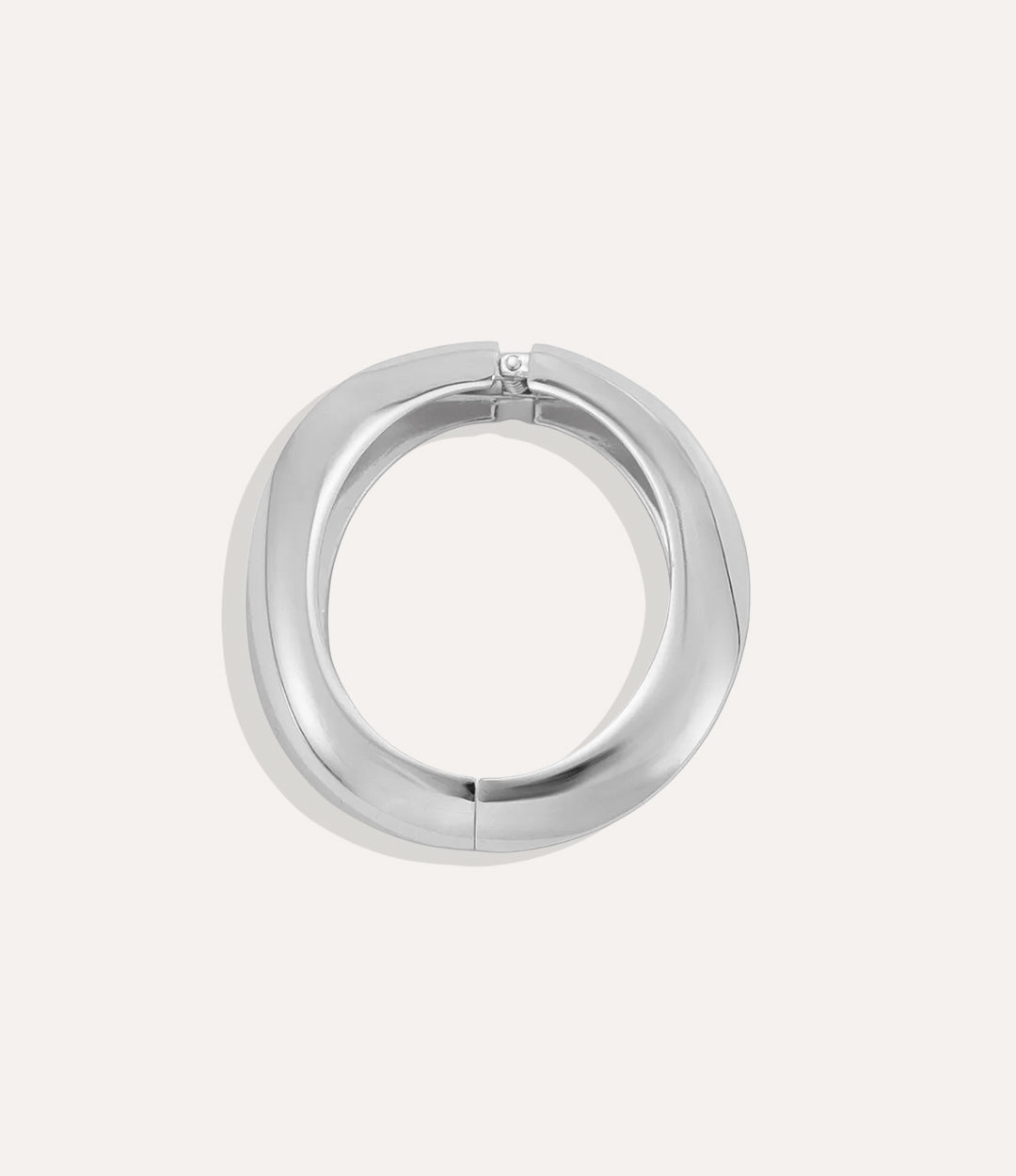 Chunky oversized Silver Mega Bangle displayed on a white background, showing its bold design