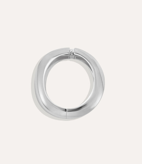 Chunky oversized Silver Mega Bangle displayed on a white background, showing its bold design