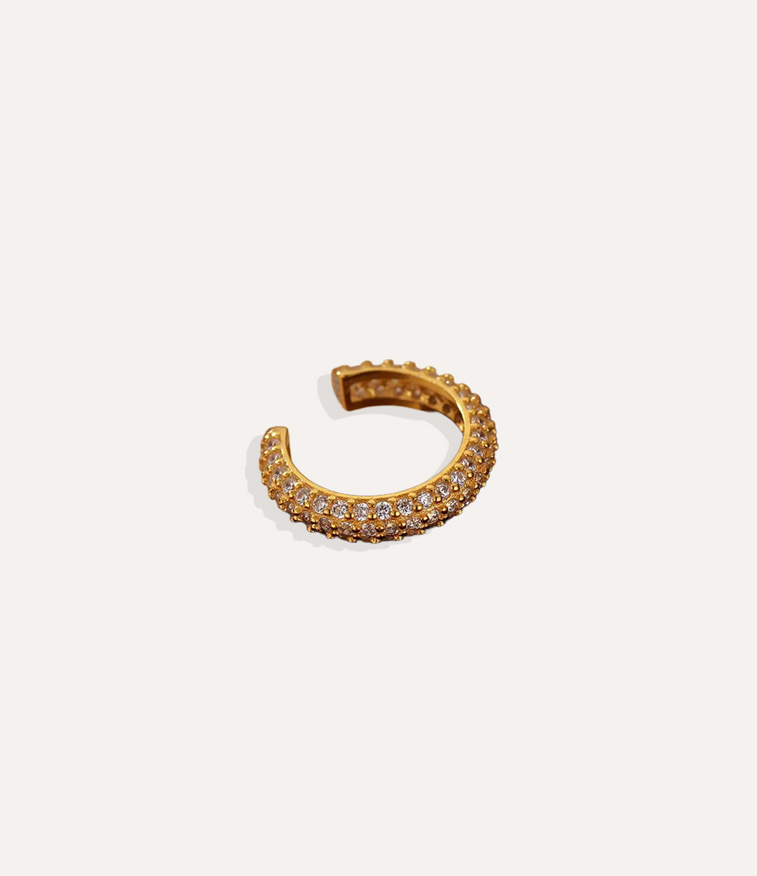 Close up of the Mini Diamond Ear Cuff in gold highlighting its subtle diamond accents and refined finish.