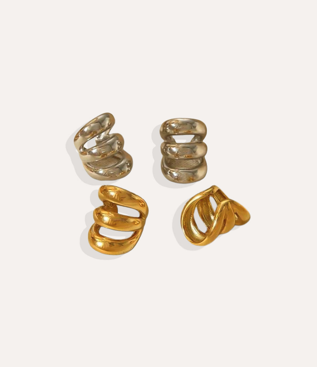 Product shot of the Mini Ear Cuff in 18k gold plating showing the smooth C-shape design and metallic finish on a white background.