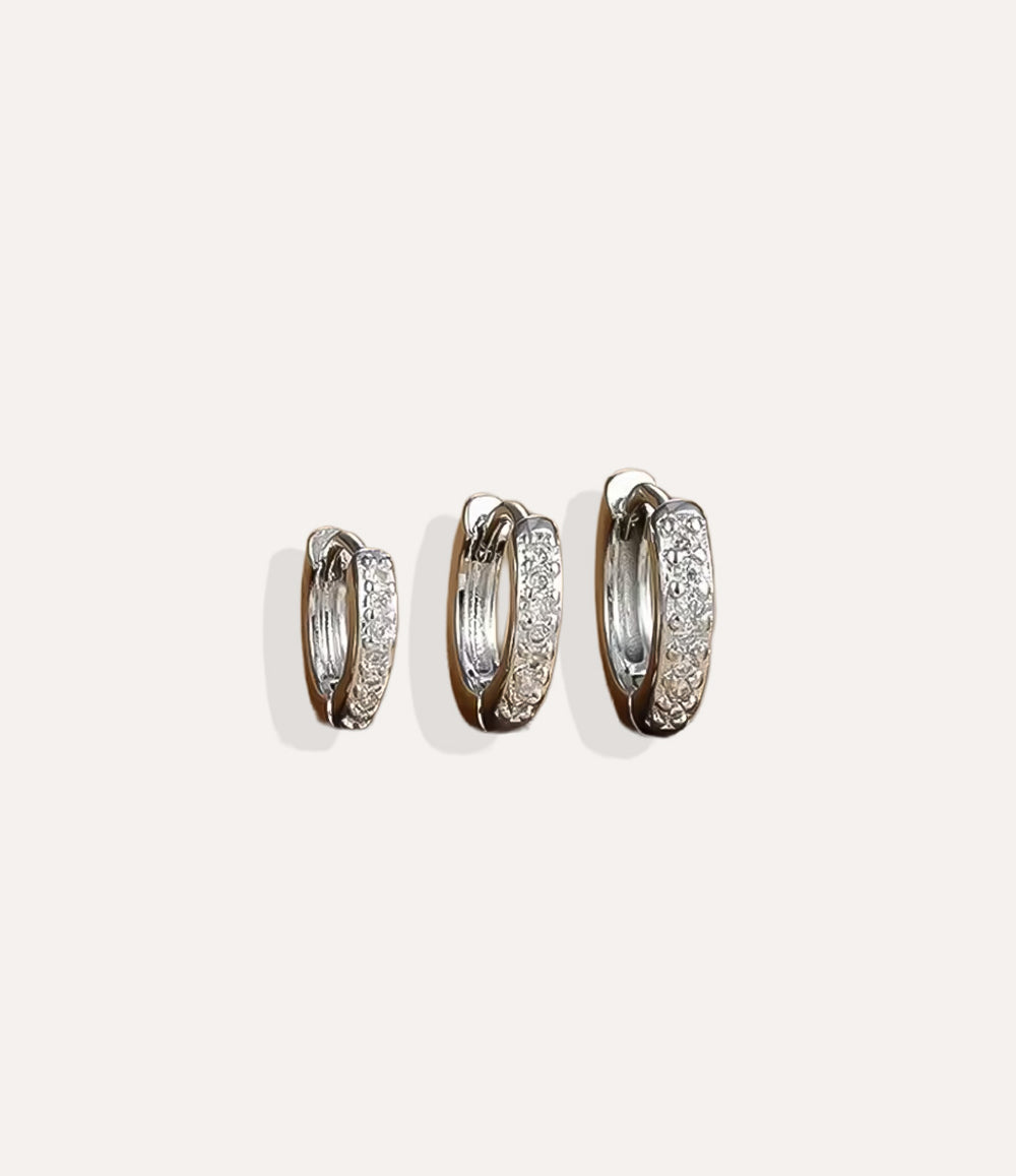 Close up of Mini Pave Hoops in silver showing the elegant hoop design and subtle pave sparkle.