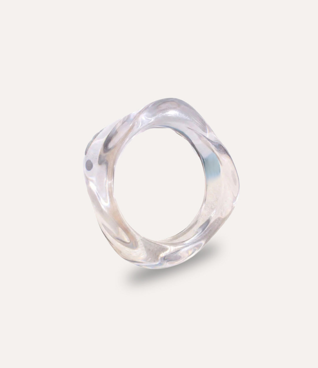Clear acrylic resin bangle with fluid, sculptural shape