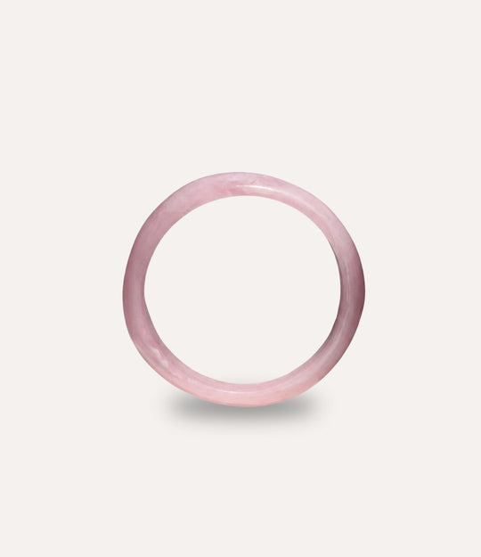 Pink acrylic resin bangle with organic, curved form
