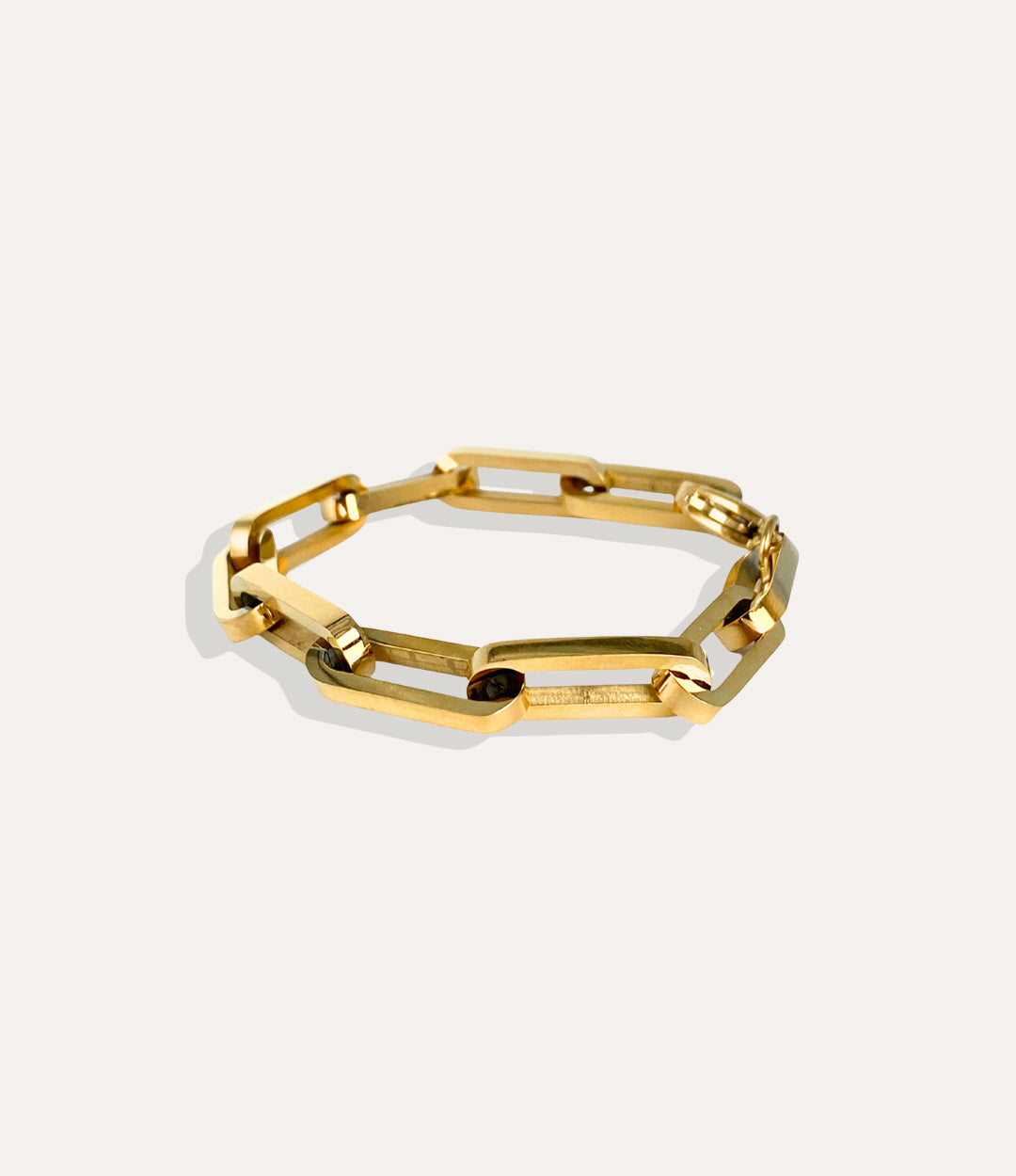Oversized Paperclip Bracelet in gold, displaying its sleek oversized chain links and polished finish.