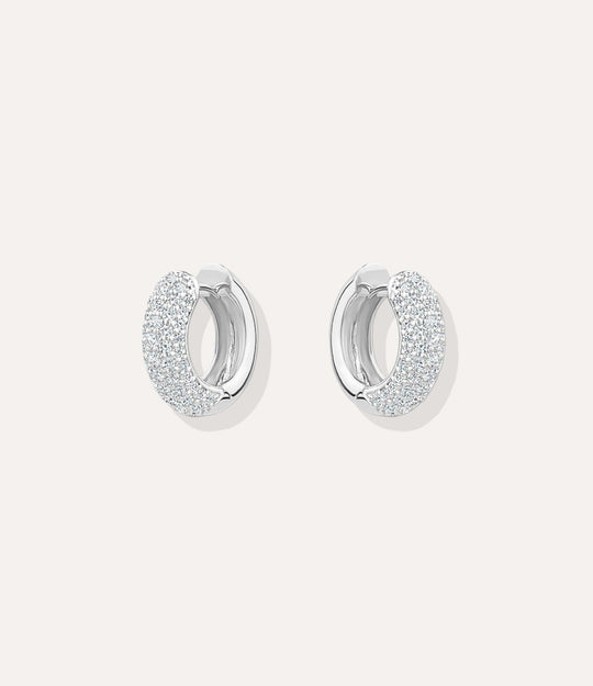 Close up of the silver Pave Hoops showing the shimmering pave detailing and sleek silver plating.