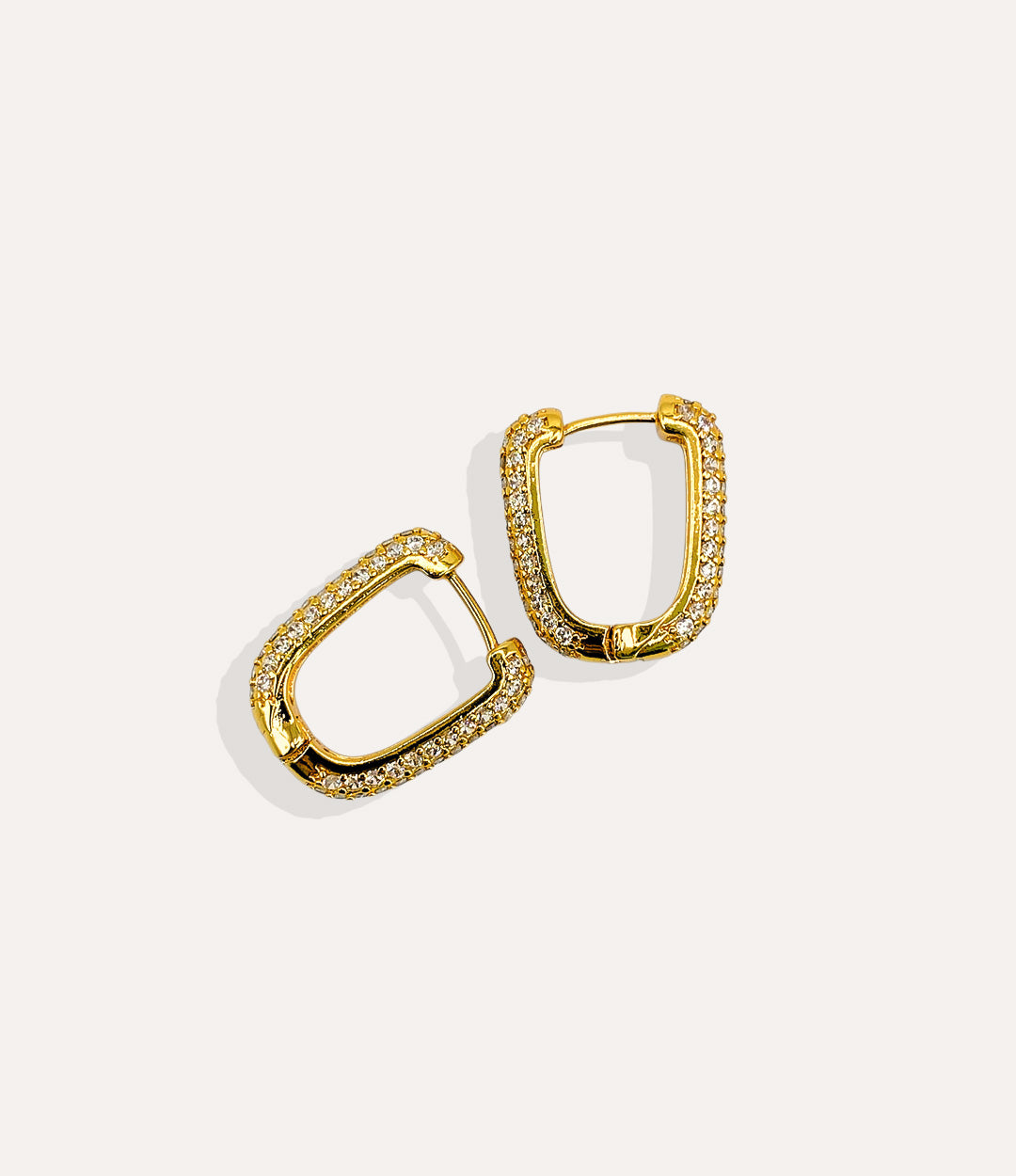 Product shot of the Pave Link Hoops in 14k gold plating displaying the pave stone setting and warm metallic finish on a white background