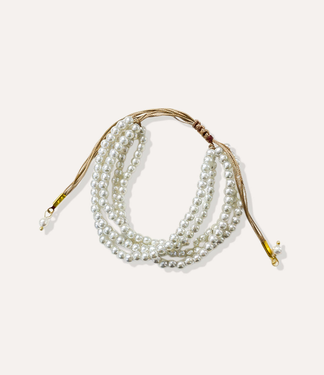 Multi-string Pearl Stack Bracelet featuring layered pearls for an elegant year-round jewelry look