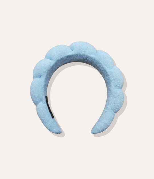 Puffy Towel Headband in blue, featuring a thick sponge-like design and soft terry cloth texture isolated on white.