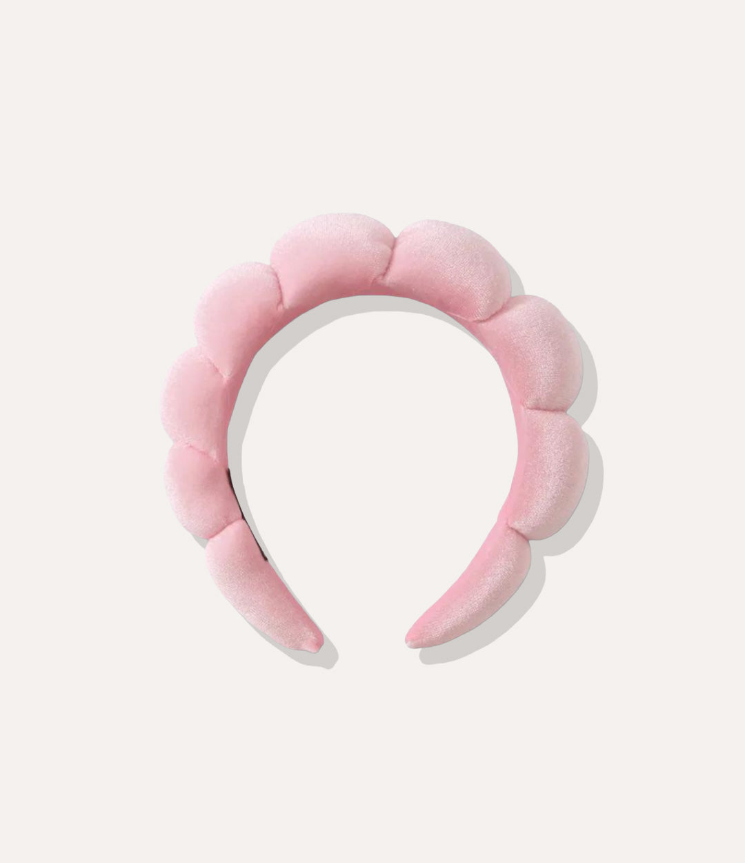 Puffy Towel Headband in pink, featuring a thick sponge-like design and soft terry cloth texture isolated on white.